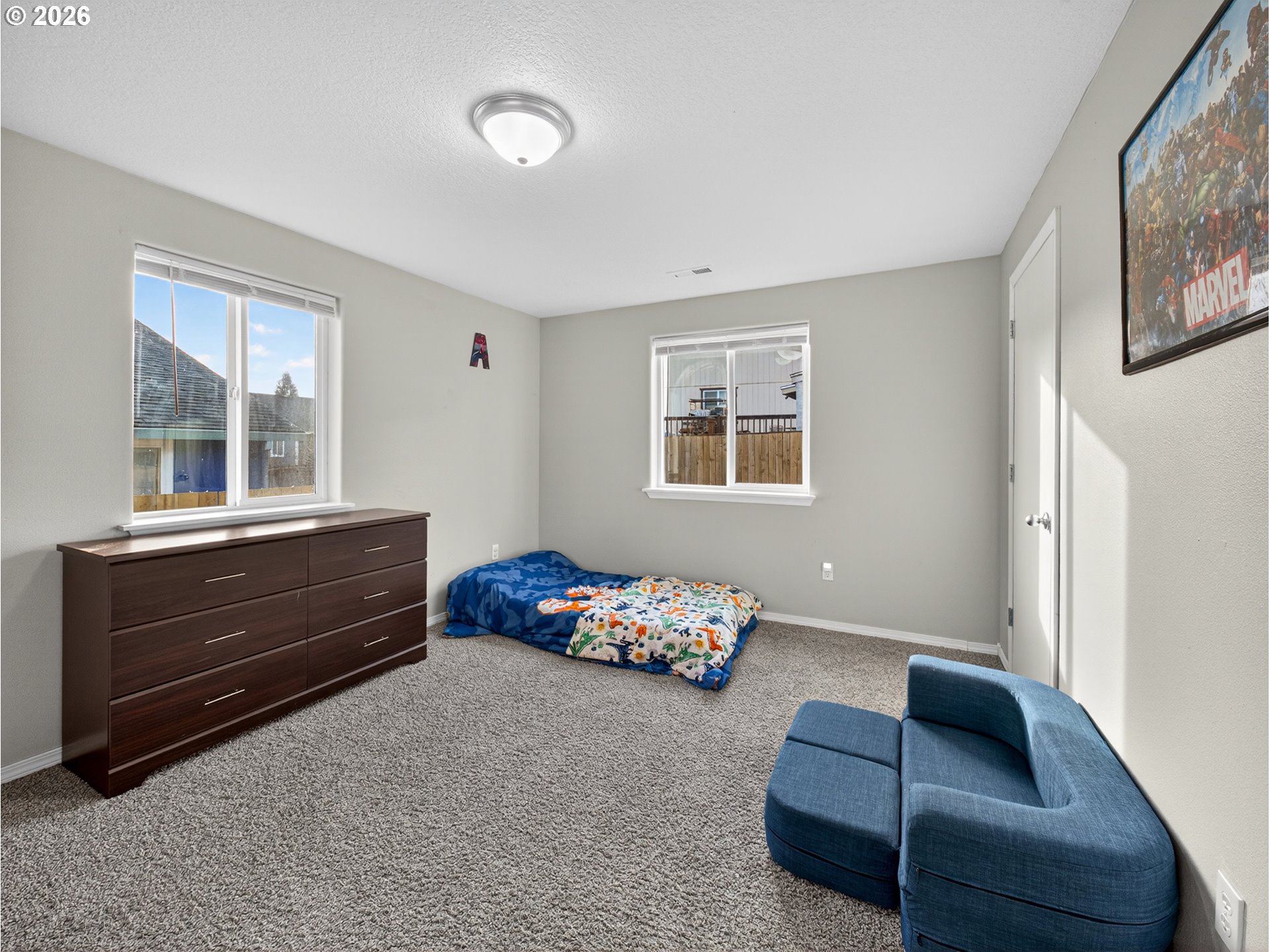 847 Northeast Duniway Road Lafayette, OR 97127 - Photo 18 of 38 a bedroom with furniture and a window