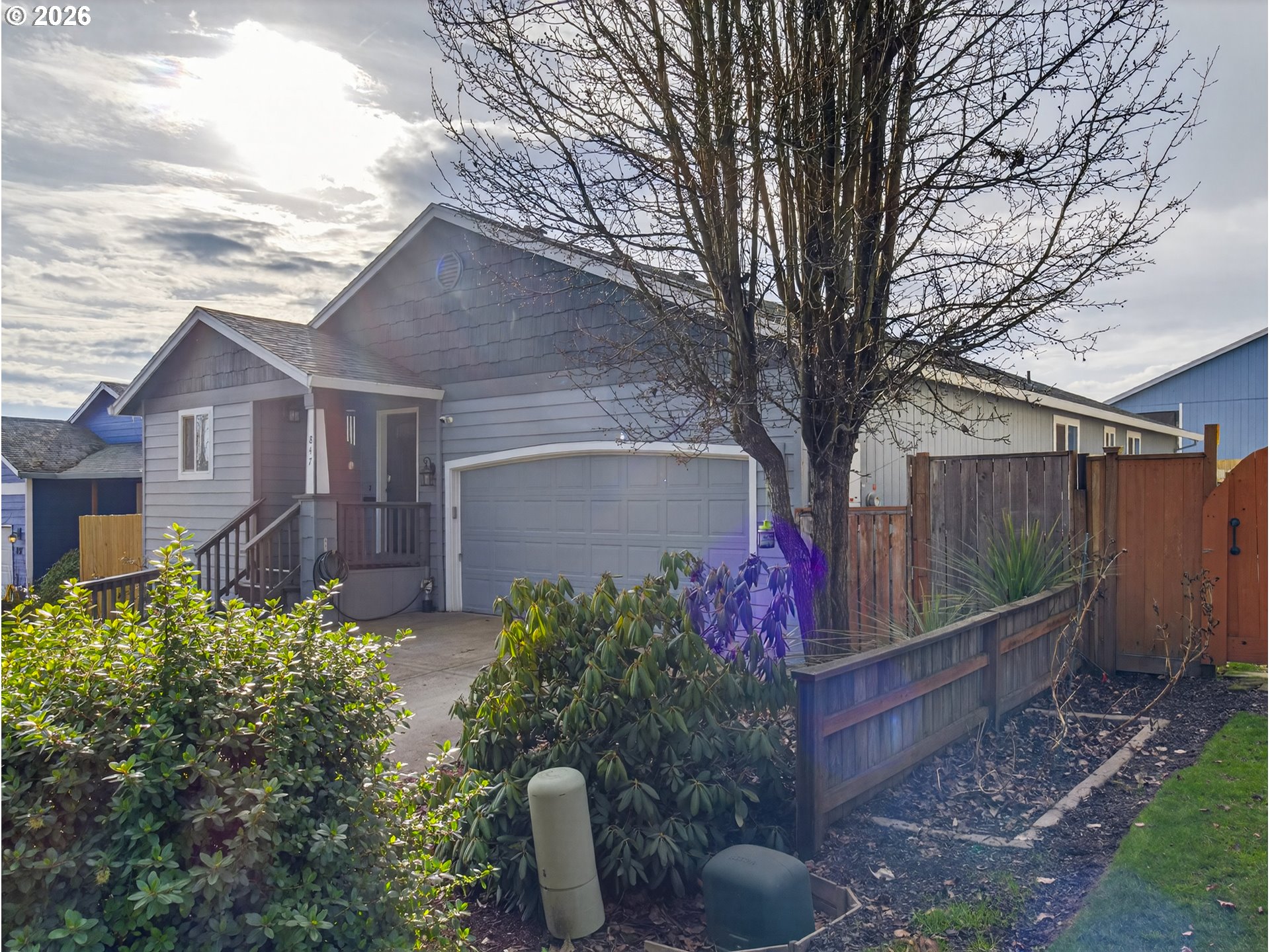 847 Northeast Duniway Road Lafayette, OR 97127 - Photo 4 of 38 a front view of a house with garden