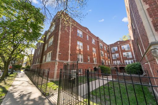 2011 West Jarvis Avenue, Unit 3 Chicago, IL 60645 - Photo 1 of 15 a view of a large building