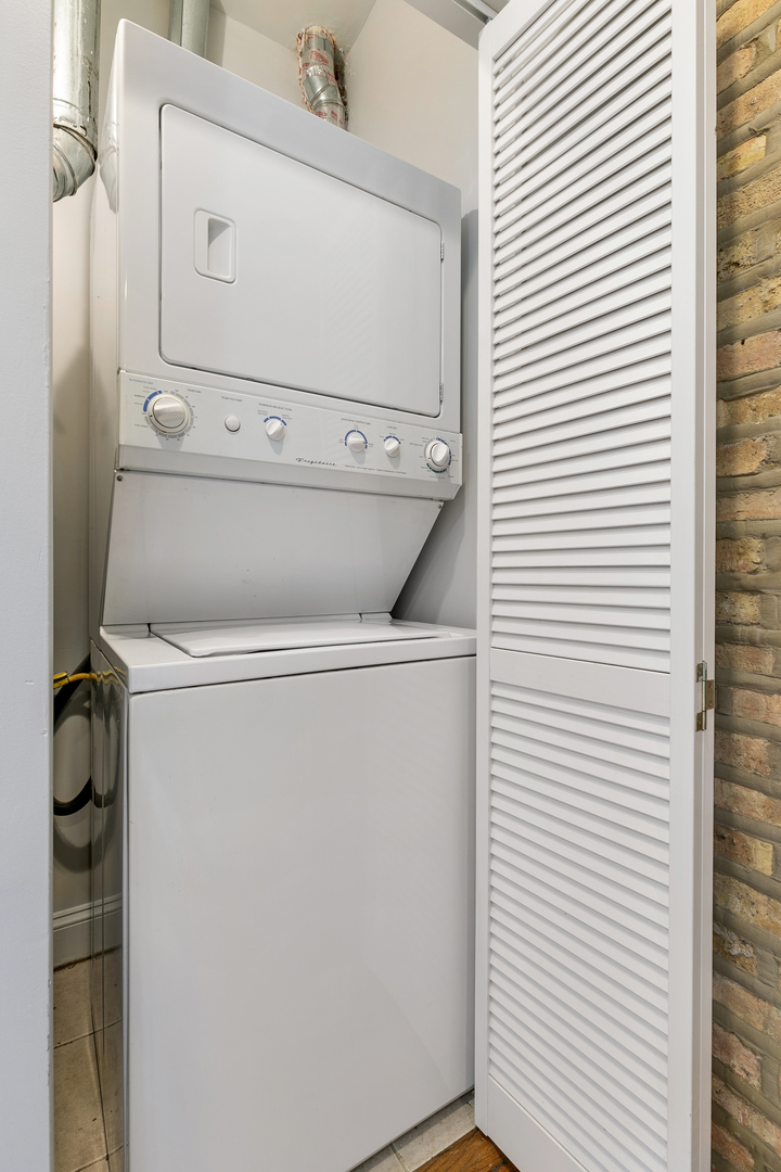 2011 West Jarvis Avenue, Unit 3 Chicago, IL 60645 - Photo 10 of 15 a close up view of a washer and dryer