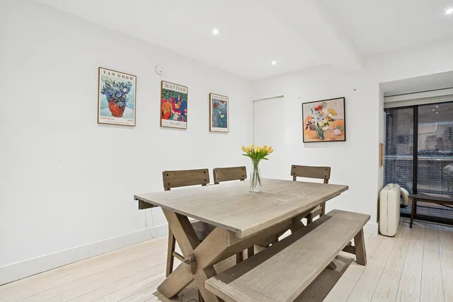 a view of a dining room with furniture