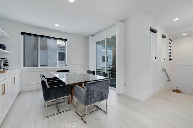 a view of a workspace with furniture