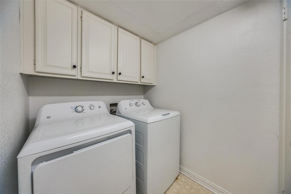 5325 Bent Tree Forest Drive, Unit 2244 Dallas, TX 75248 - Photo 12 of 15 a utility room with dryer and washer