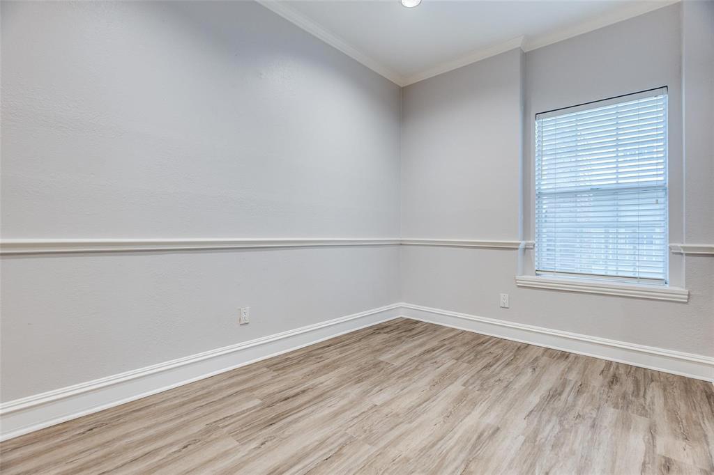 5325 Bent Tree Forest Drive, Unit 2244 Dallas, TX 75248 - Photo 8 of 15 wooden floor in an empty room with a window