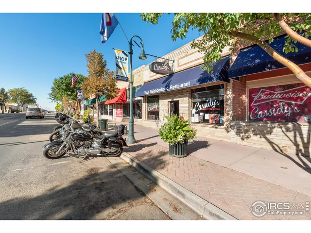 a view of a chairs and tables in the patio