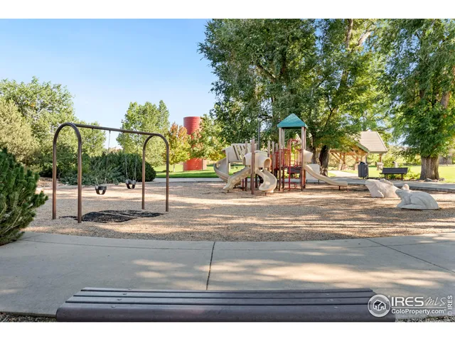 a view of street with a houses