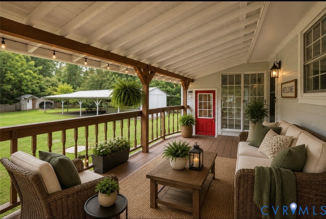 20100 Frog Level Road Ruther Glen, VA 22546 - Photo 19 of 28 Covered porch with wood-finish decking, white slat