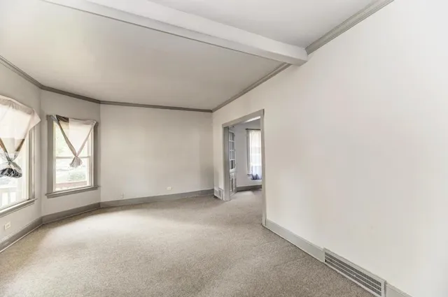 an empty room with windows