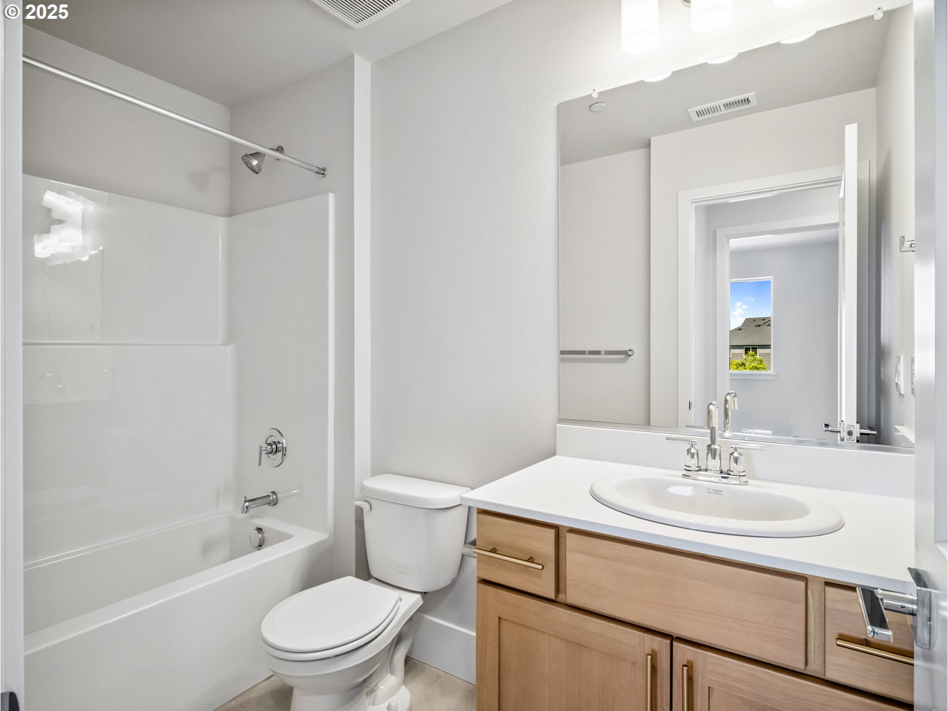11950 Southwest 176th Drive Beaverton, OR 97007 - Photo 15 of 20 a bathroom with a sink toilet and shower
