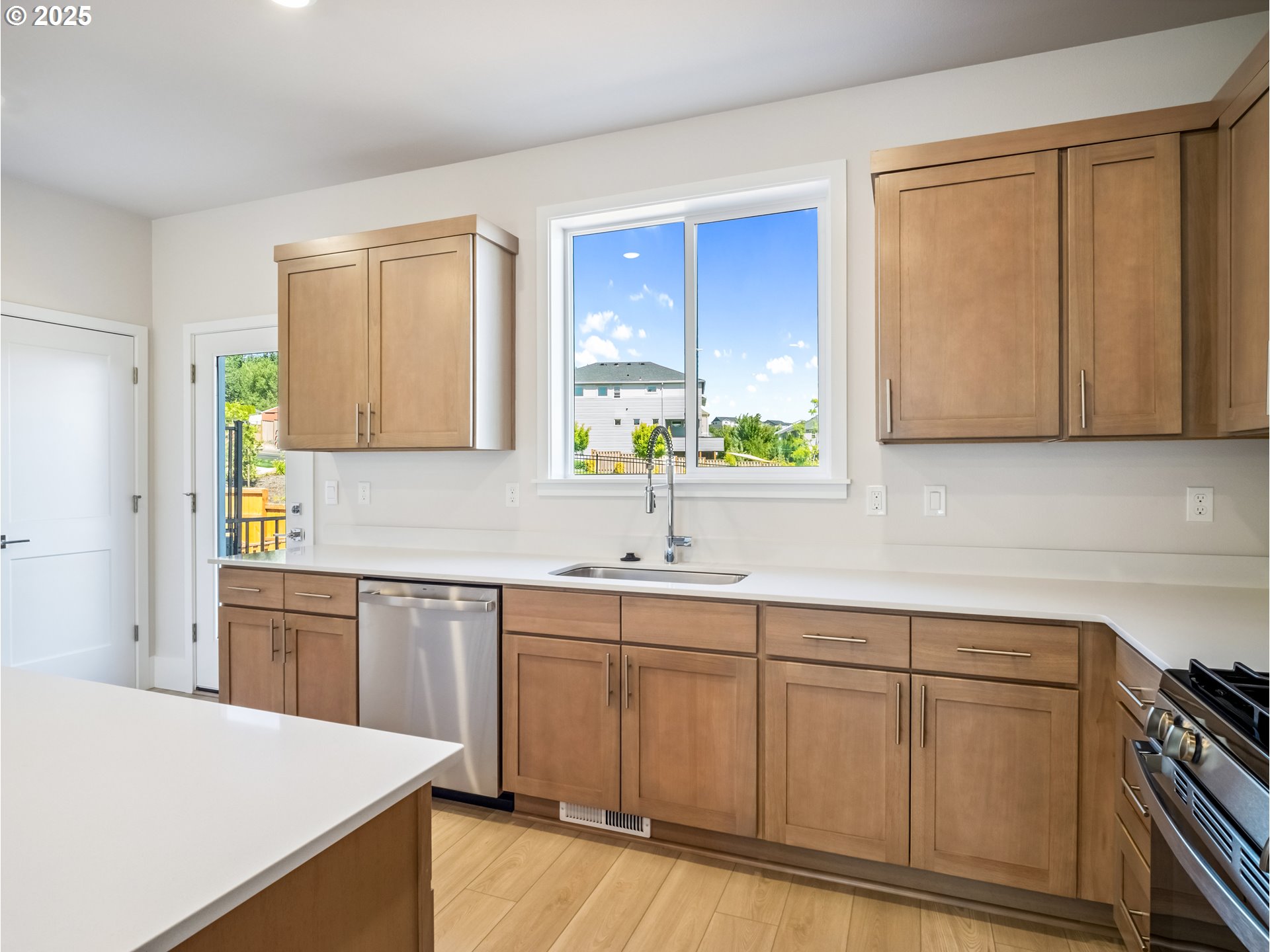 11950 Southwest 176th Drive Beaverton, OR 97007 - Photo 20 of 20 a kitchen with a sink cabinets and window