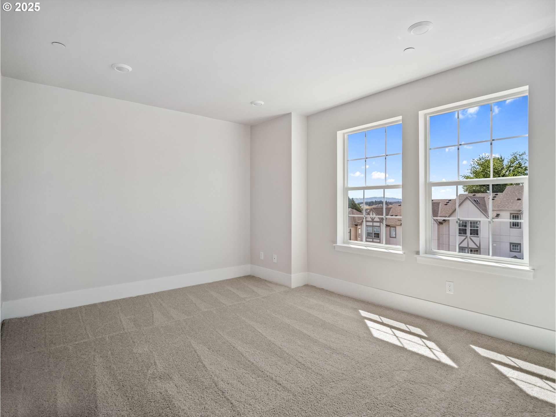 11950 Southwest 176th Drive Beaverton, OR 97007 - Photo 9 of 20 a view of an empty room with a window