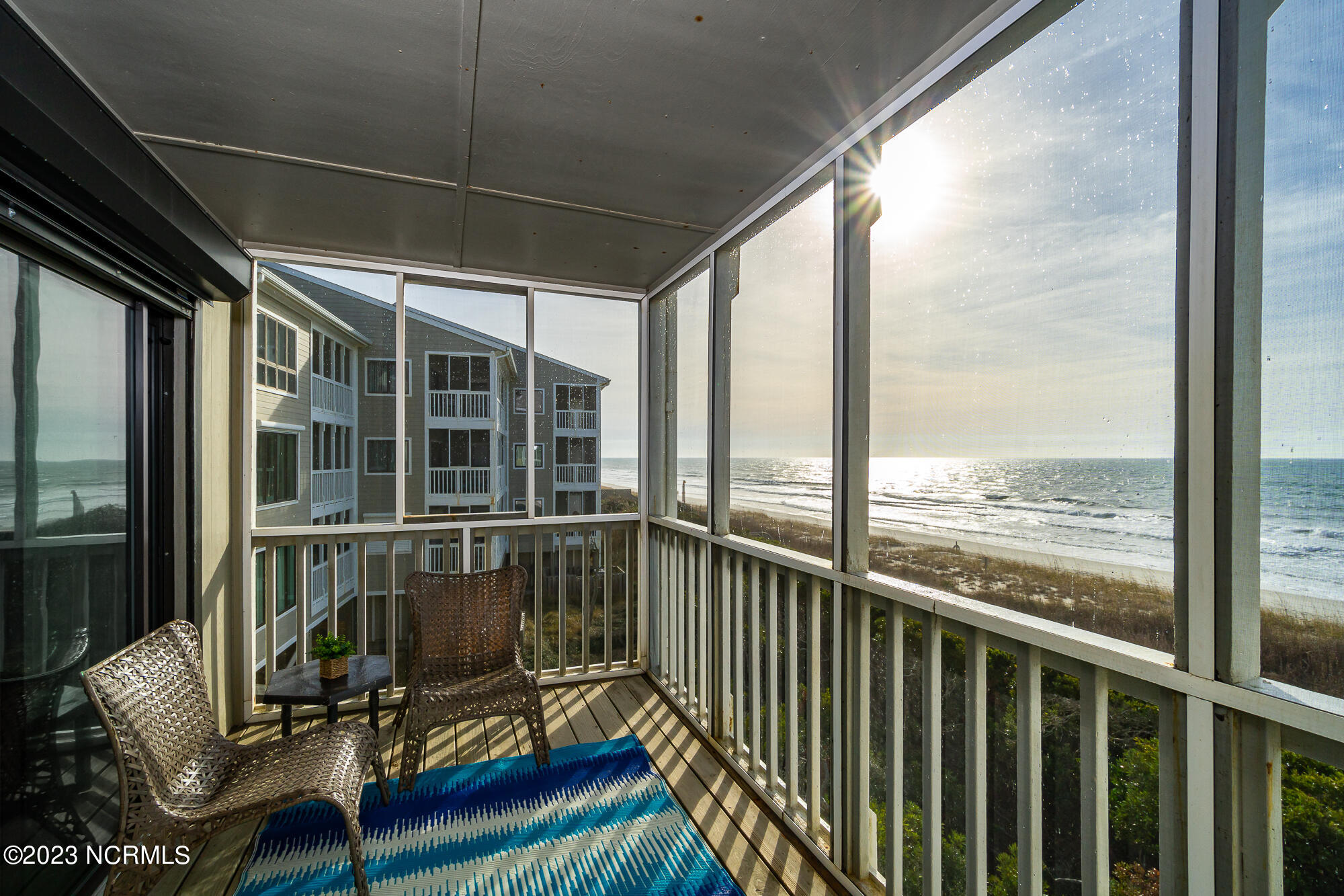 525 Salter Path Road, Unit B25 Atlantic Beach, NC 28512 - Photo 12 of 39 Screened porch off LR