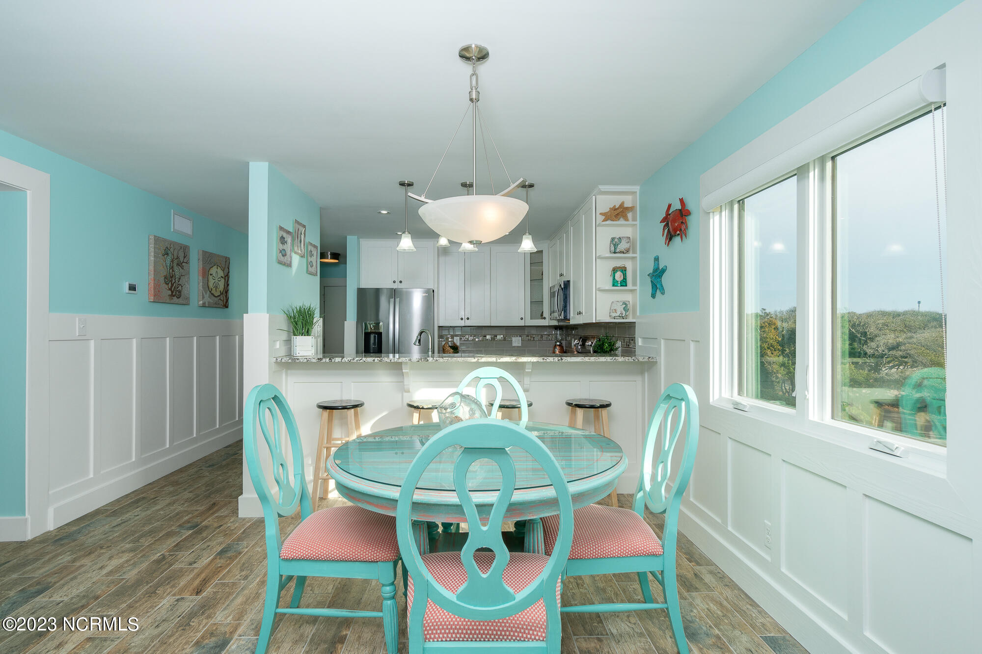 525 Salter Path Road, Unit B25 Atlantic Beach, NC 28512 - Photo 13 of 39 Dining space and kitchen