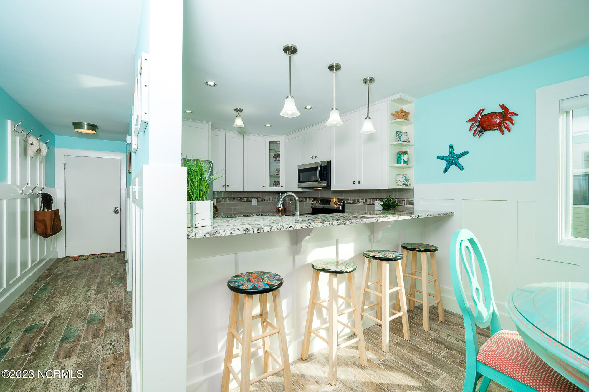 525 Salter Path Road, Unit B25 Atlantic Beach, NC 28512 - Photo 14 of 39 Dining space and kitchen