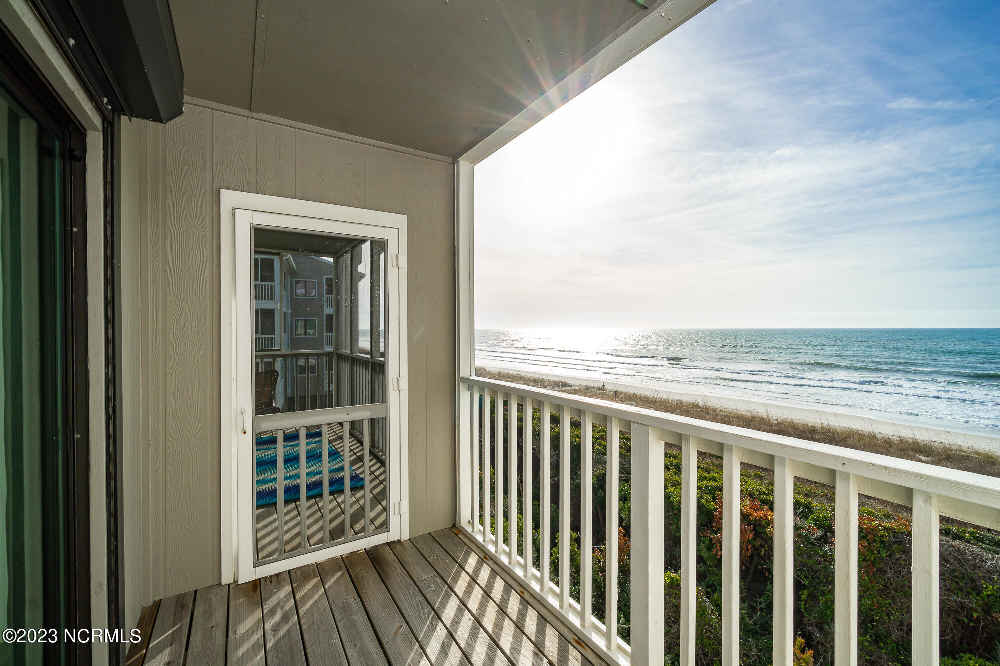 525 Salter Path Road, Unit B25 Atlantic Beach, NC 28512 - Photo 19 of 39 Private covered porch off primary suite