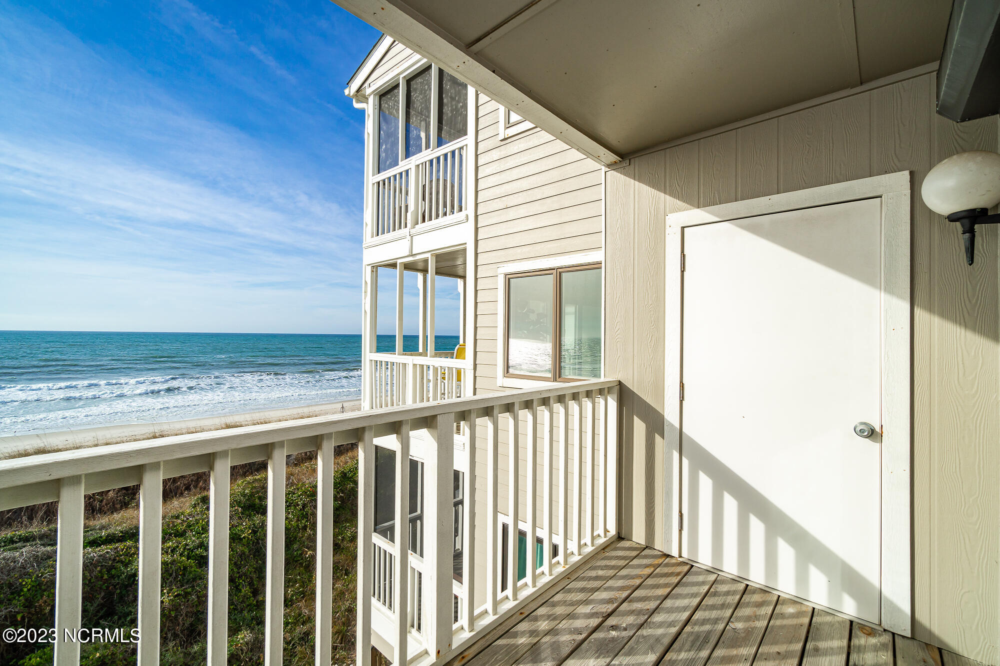 525 Salter Path Road, Unit B25 Atlantic Beach, NC 28512 - Photo 27 of 39 Storage closet on porch