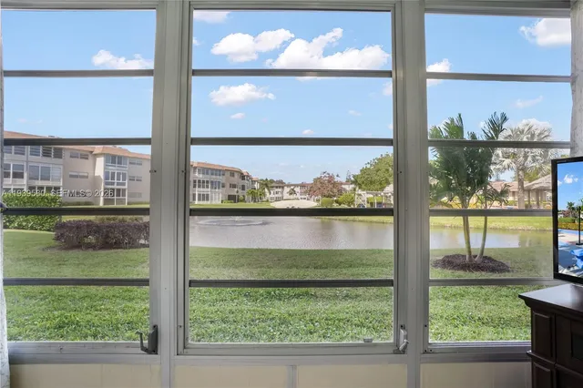 a view of swimming pool with a lake view