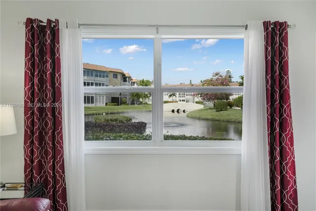 a kitchen with a sink and a stove top oven