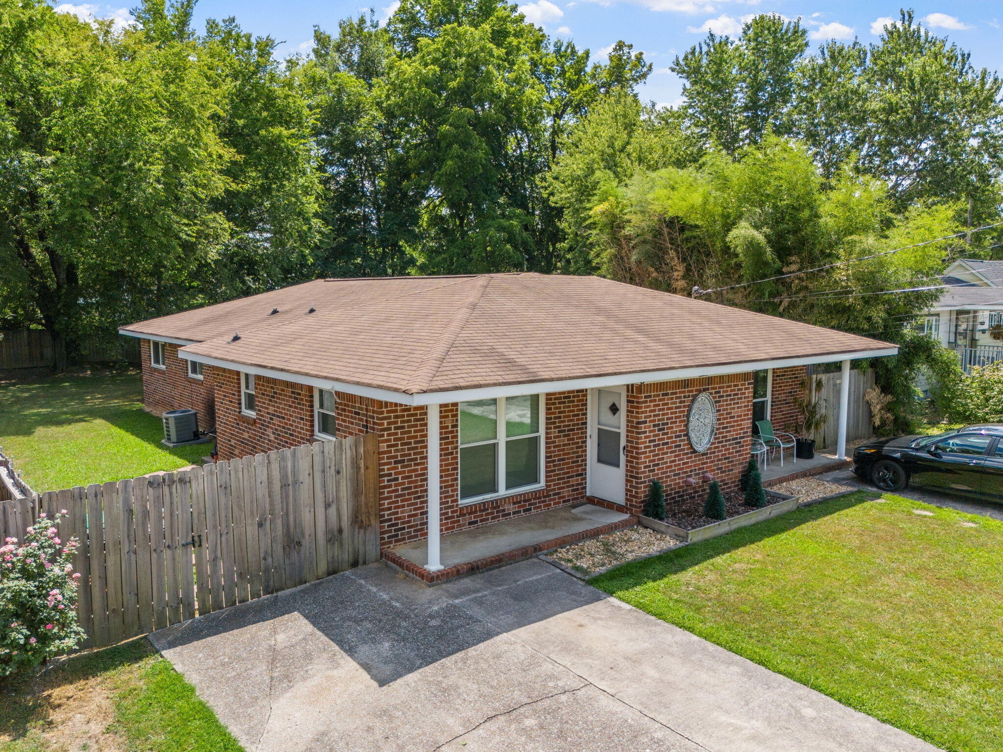 4222 Ealy Road Chattanooga, TN 37412 - Photo 6 of 26 a view of a house with a yard patio and deck