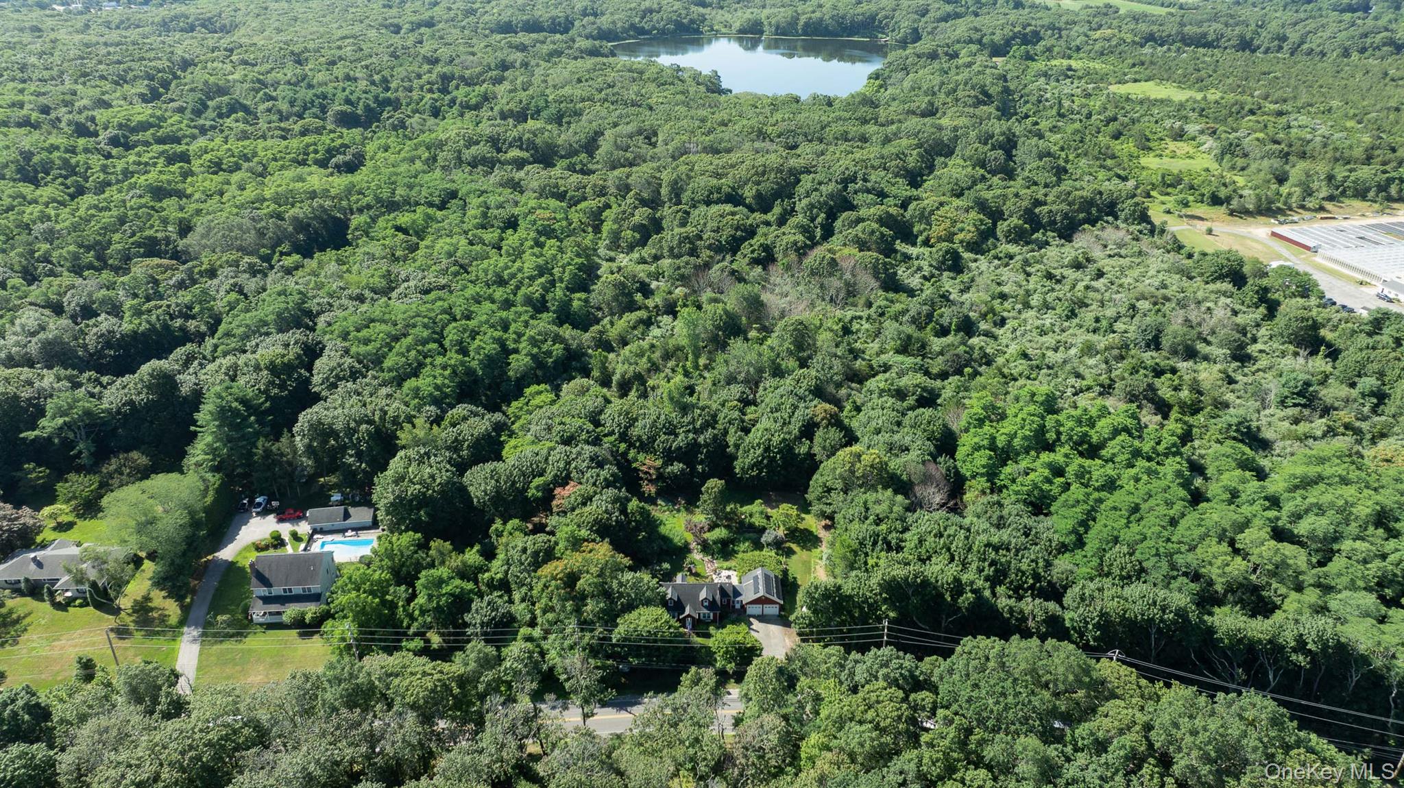 5660 Sound Avenue Mattituck, NY 11952 - Photo 2 of 43 Your backyard and the closest neighbor is Laurel Lake