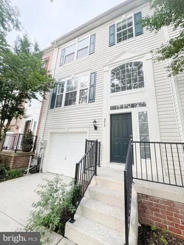 a front view of a house with a porch