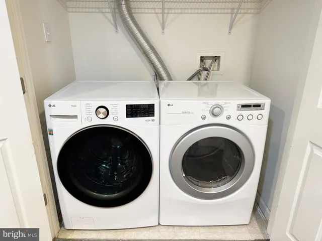 a view of a balcony with wooden floor