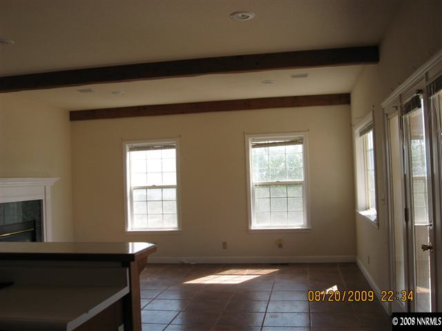 14150 Raider Run Road Reno, NV 89511 - Photo 3 of 9 a living room with furniture and a window