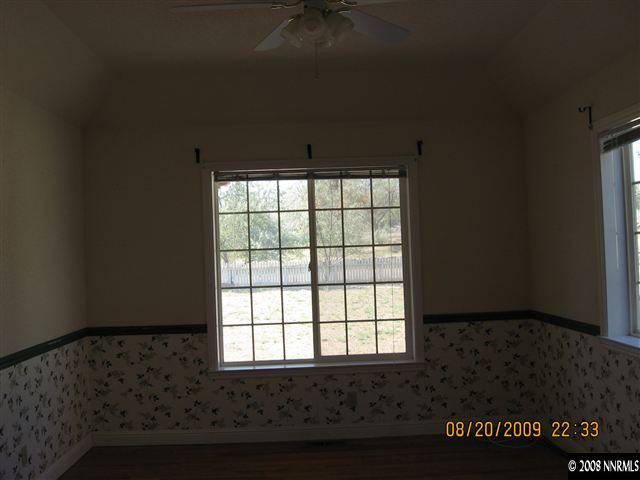 14150 Raider Run Road Reno, NV 89511 - Photo 4 of 9 a view of an empty room and window