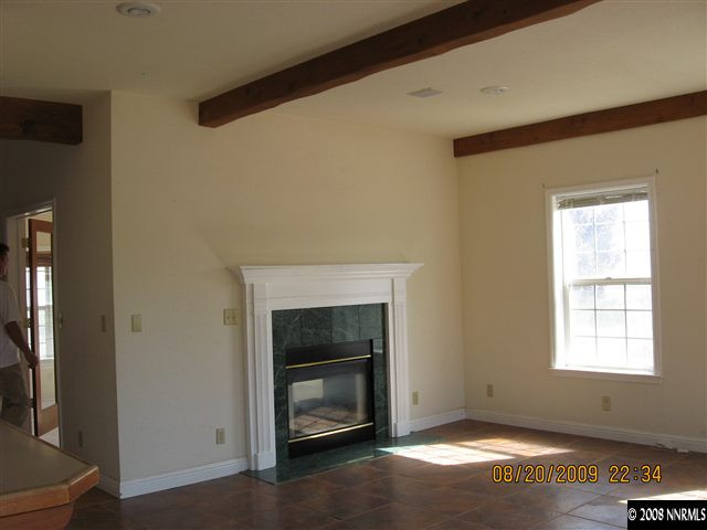 14150 Raider Run Road Reno, NV 89511 - Photo 6 of 9 a living room with a fireplace