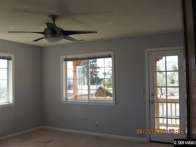 14150 Raider Run Road Reno, NV 89511 - Photo 7 of 9 an empty room with a window