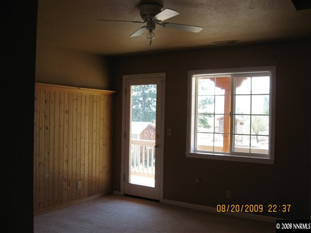 14150 Raider Run Road Reno, NV 89511 - Photo 8 of 9 an empty room with windows and closet
