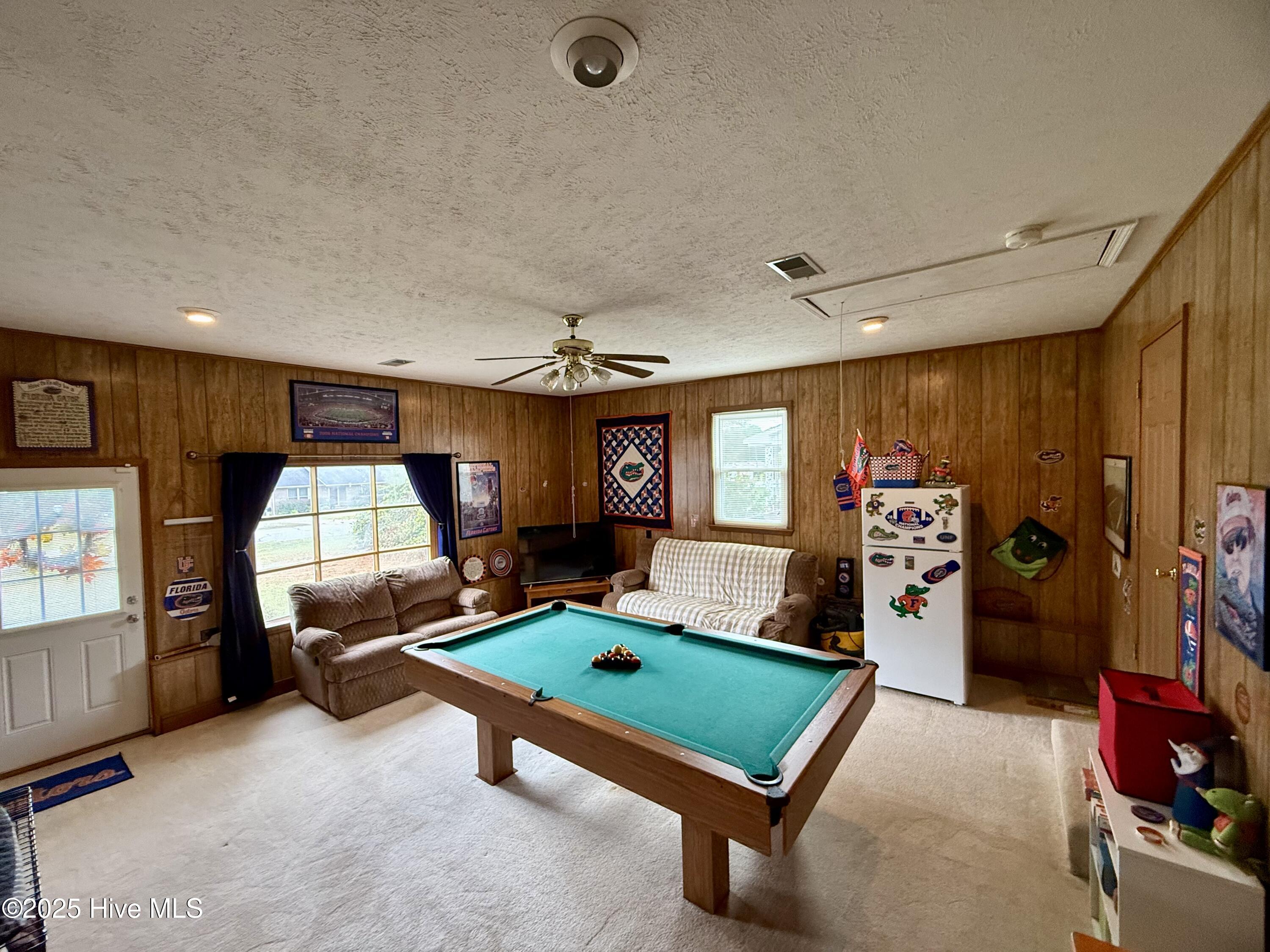 11561 Purcell Road Laurinburg, NC 28352 - Photo 15 of 36 Huge game room and pool table stays