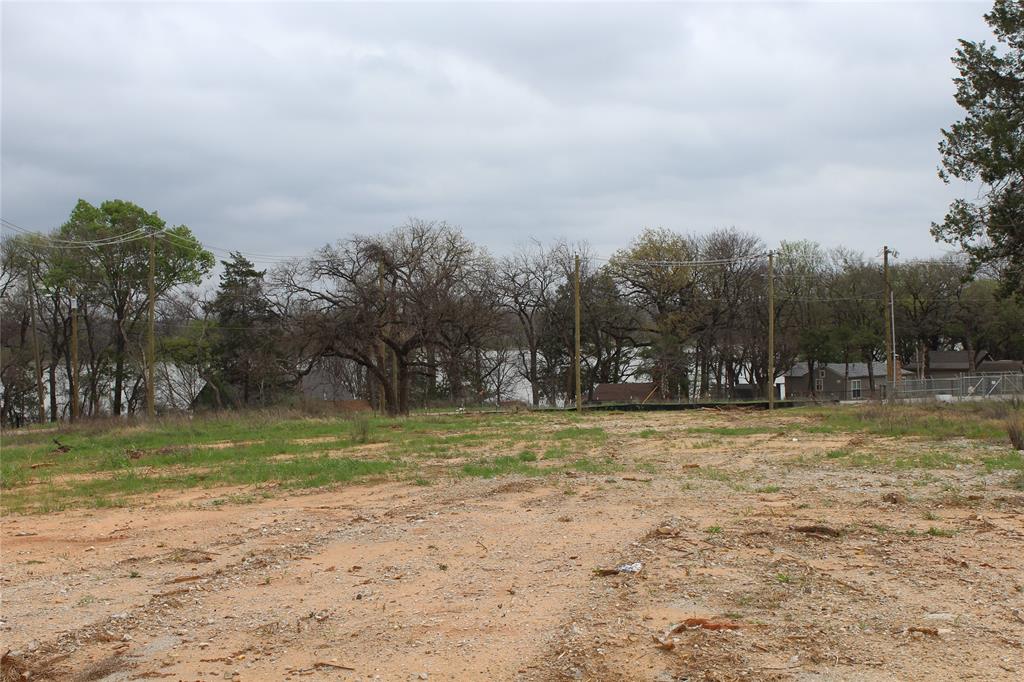 2320 Post Oak Road Wilmer, TX 75172 - Photo 11 of 14 a view of a yard with large trees
