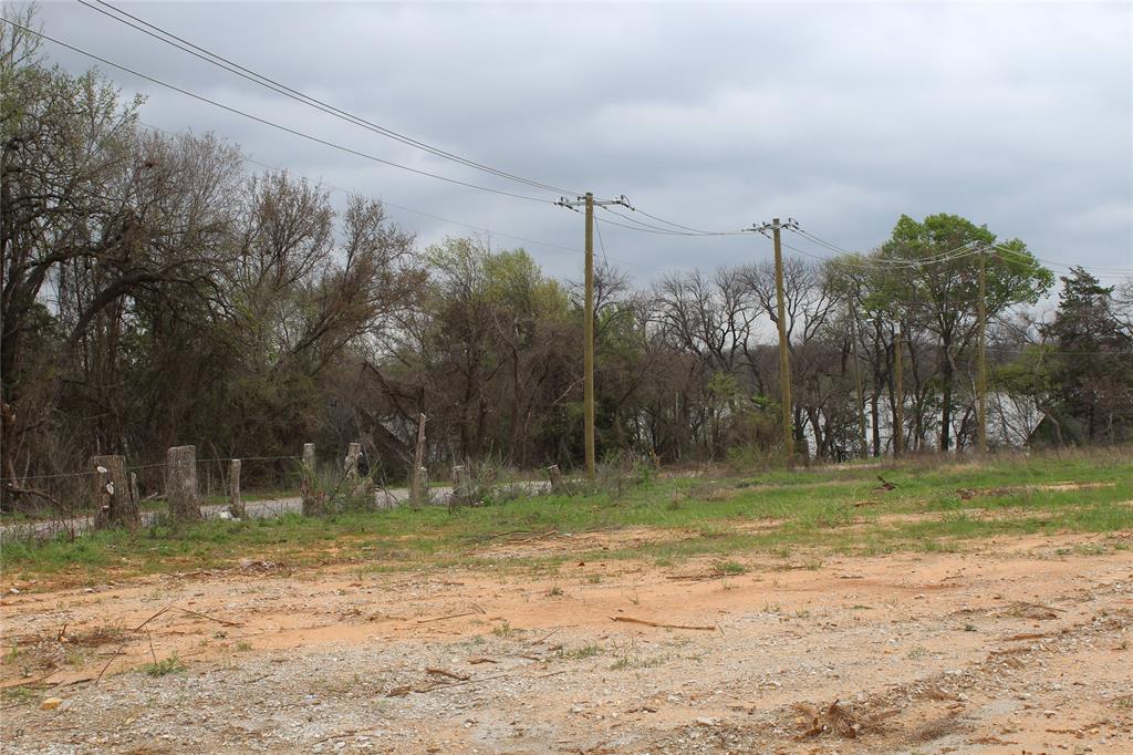 2320 Post Oak Road Wilmer, TX 75172 - Photo 12 of 14 a backyard of a house with lots of green space