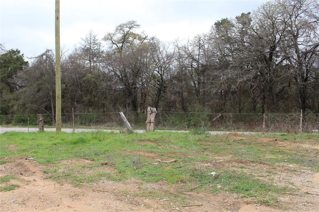 2320 Post Oak Road Wilmer, TX 75172 - Photo 14 of 14 a backyard of a house with lots of green space