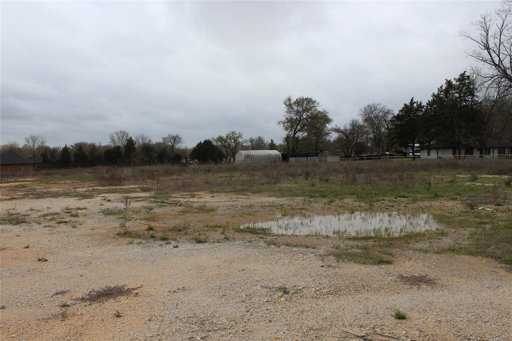 2320 Post Oak Road Wilmer, TX 75172 - Photo 3 of 14 a view of a lake with beach
