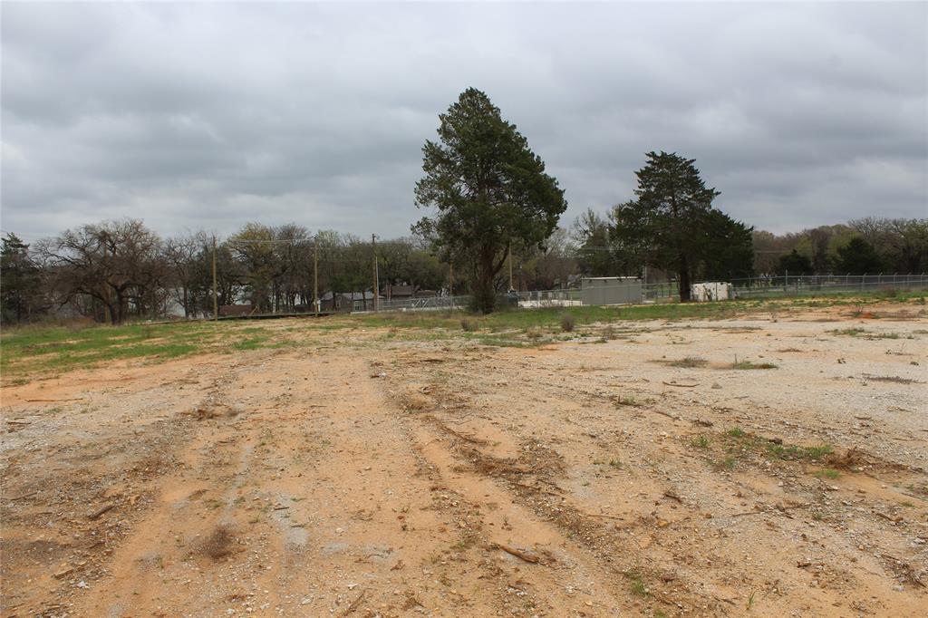 2320 Post Oak Road Wilmer, TX 75172 - Photo 8 of 14 a backyard of a house with lots of green space