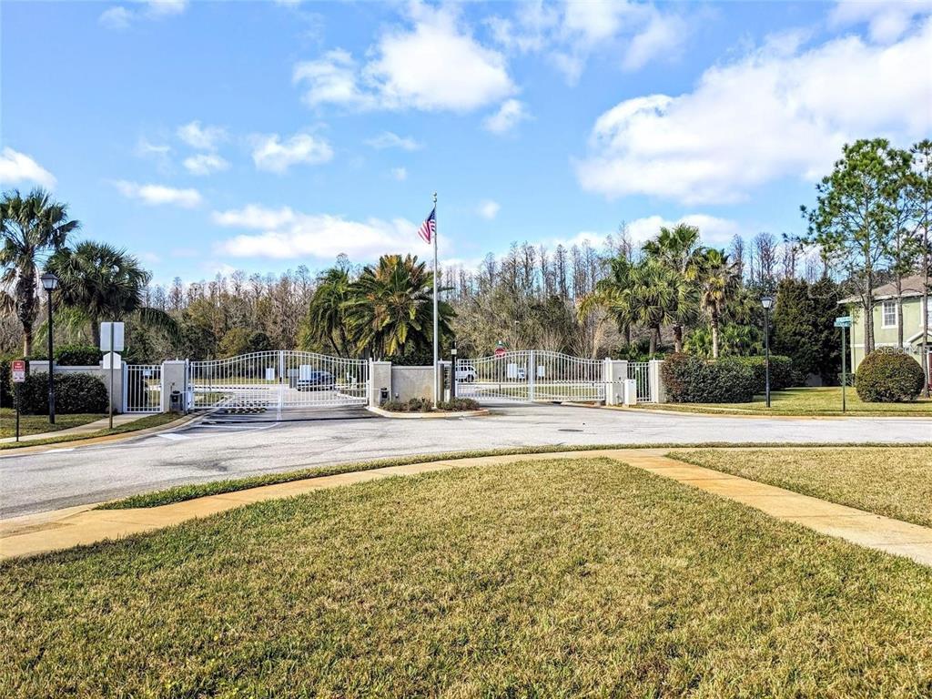 27747 Pleasure Ride Loop Wesley Chapel, FL 33544 - Photo 47 of 56 a view of a swimming pool with an outdoor space and seating area