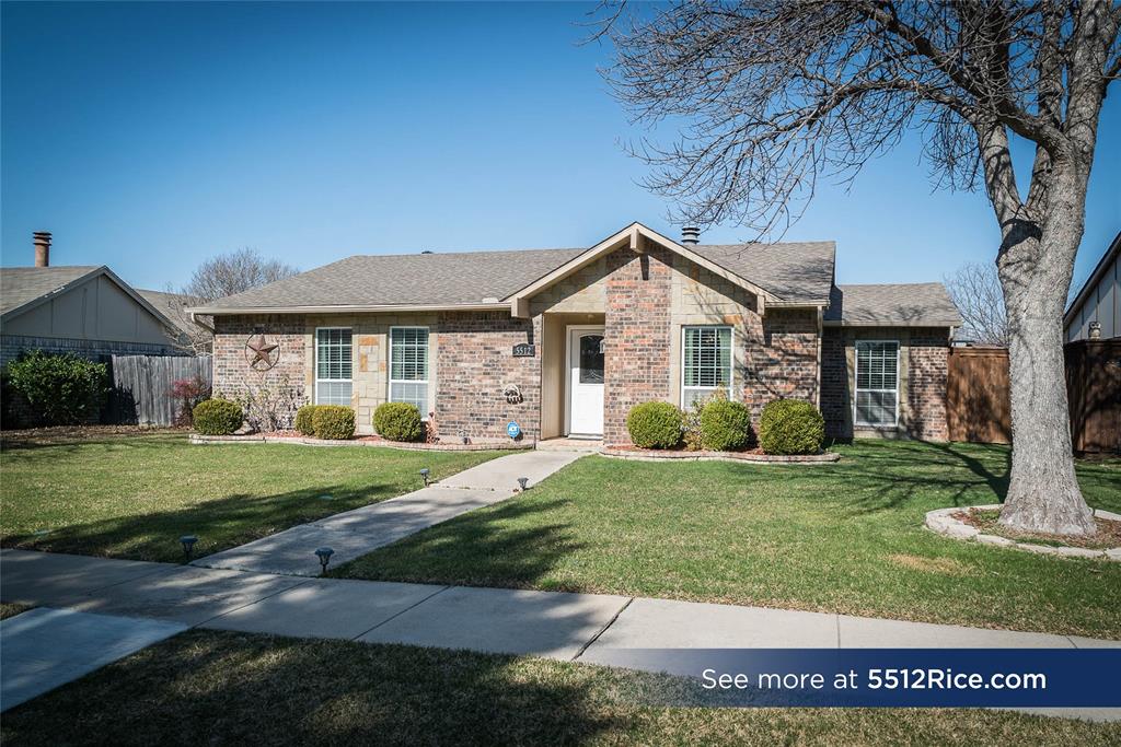 5512 Rice Drive The Colony, TX 75056 - Photo 1 of 1 a front view of a house with a yard