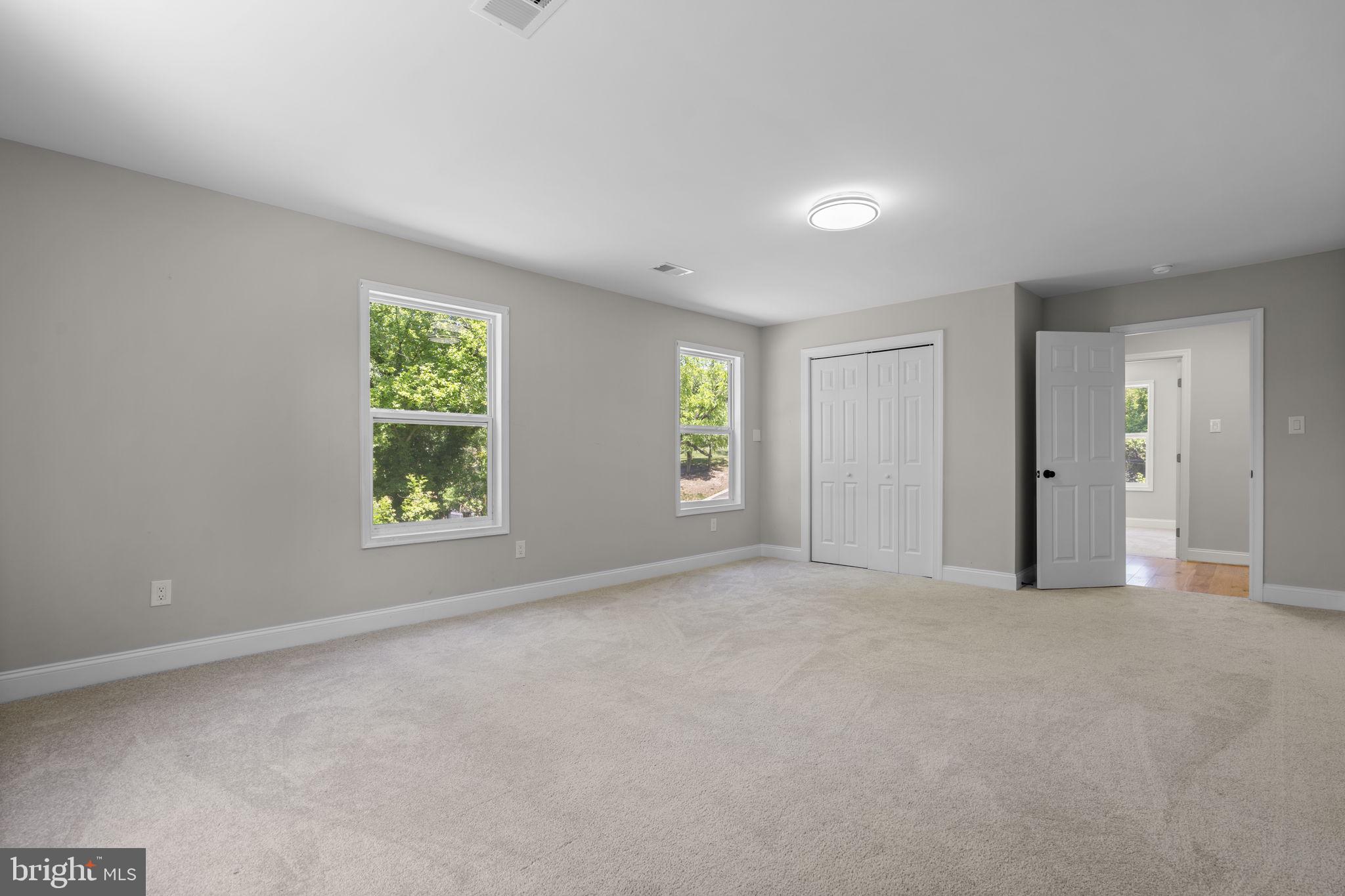 1501 Pine Grove Road Capitol Heights, MD 20743 - Photo 14 of 44 an empty room with windows and closet