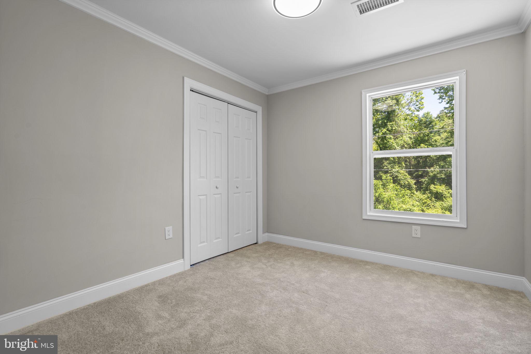 1501 Pine Grove Road Capitol Heights, MD 20743 - Photo 21 of 44 an empty room with windows