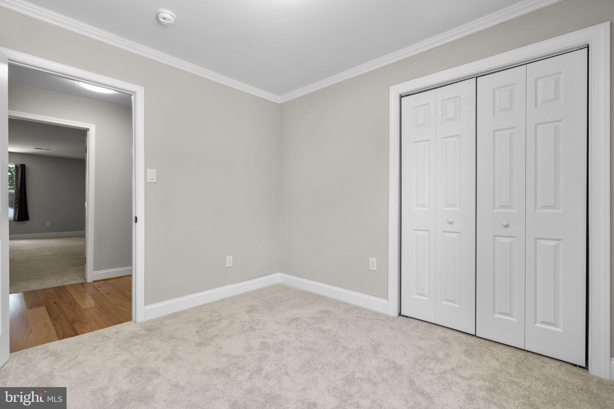 1501 Pine Grove Road Capitol Heights, MD 20743 - Photo 22 of 44 an empty room with mirror