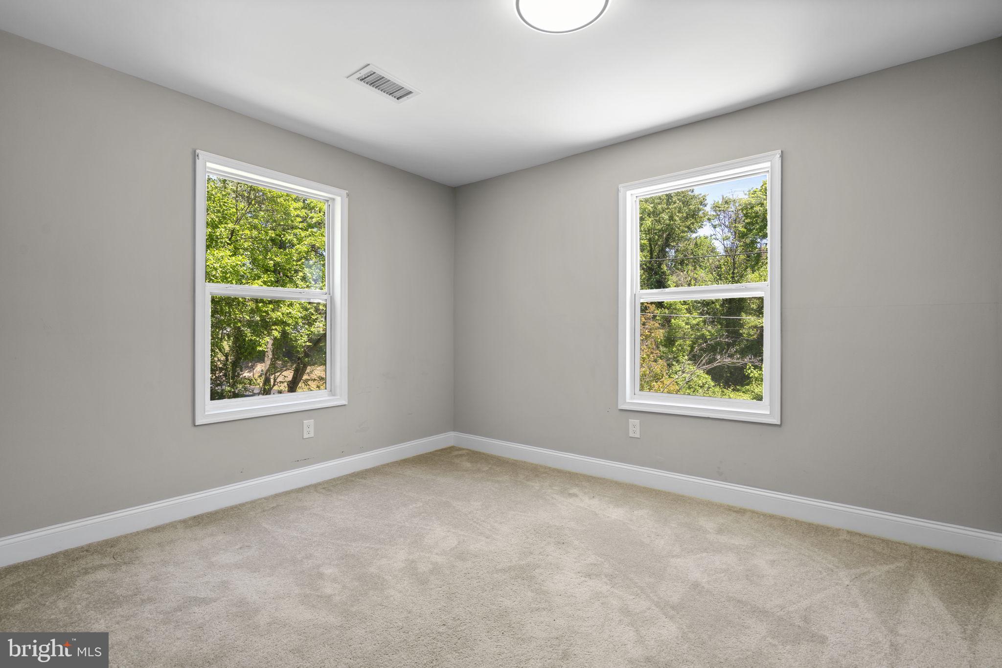 1501 Pine Grove Road Capitol Heights, MD 20743 - Photo 25 of 44 an empty room with windows