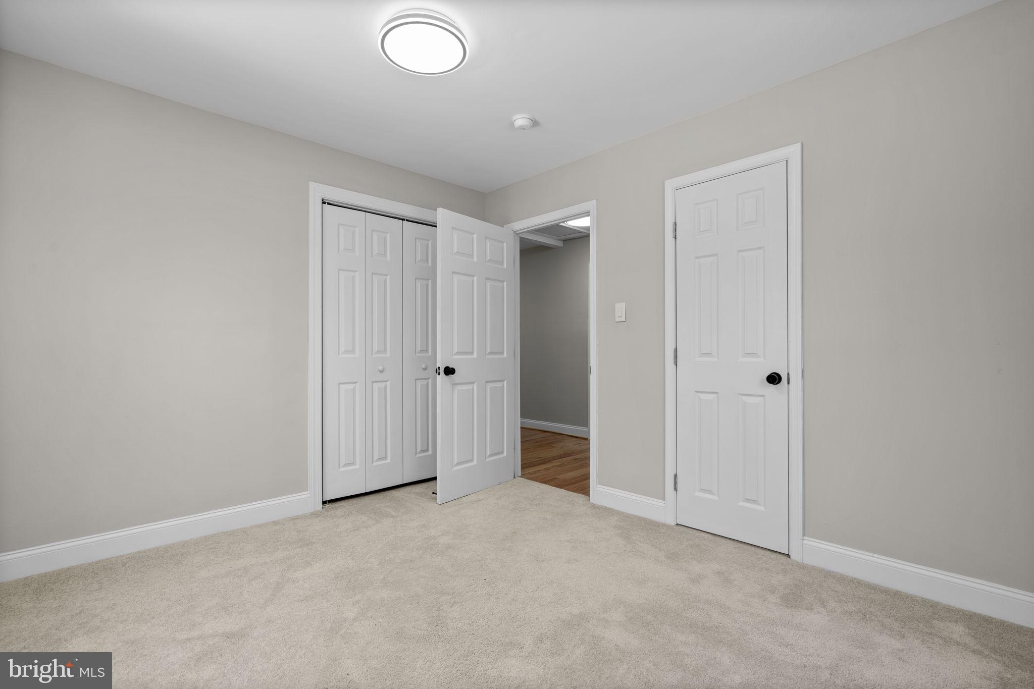 1501 Pine Grove Road Capitol Heights, MD 20743 - Photo 26 of 44 an empty room with closet area