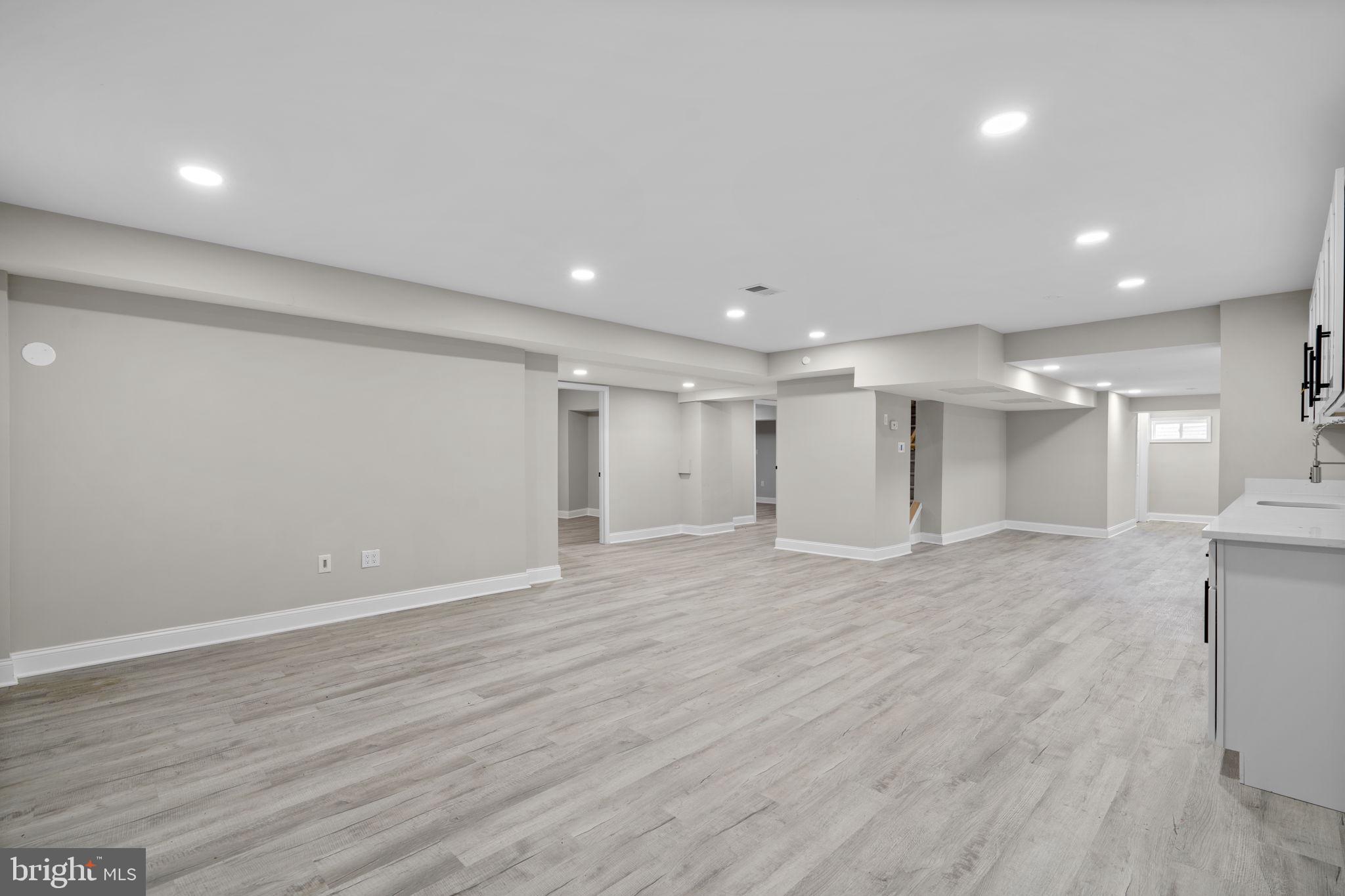1501 Pine Grove Road Capitol Heights, MD 20743 - Photo 31 of 44 a view of an empty room with wooden floor