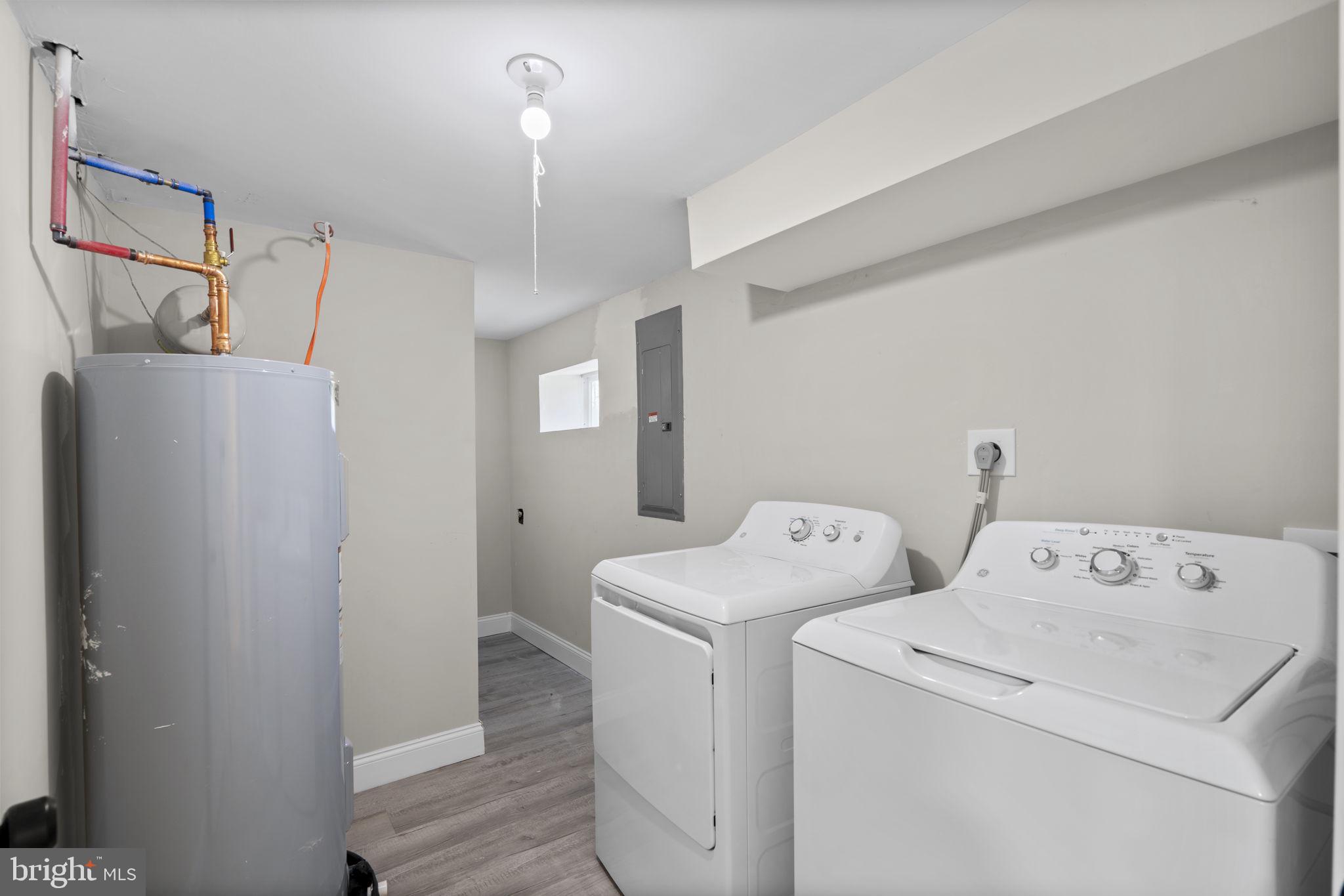 1501 Pine Grove Road Capitol Heights, MD 20743 - Photo 36 of 44 a utility room with dryer and washer