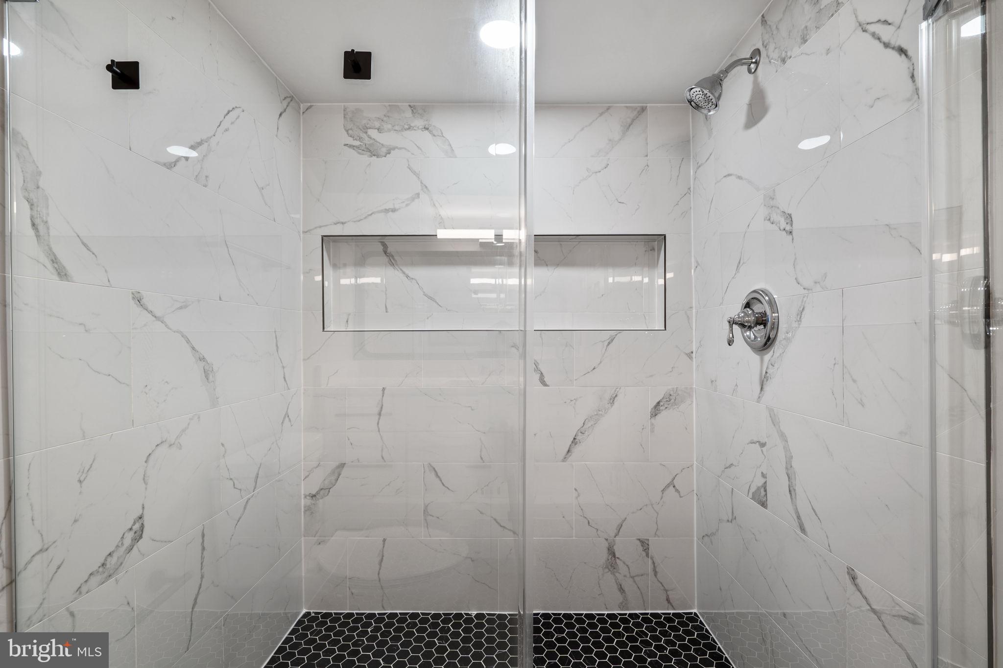 1501 Pine Grove Road Capitol Heights, MD 20743 - Photo 38 of 44 a bathroom with a shower