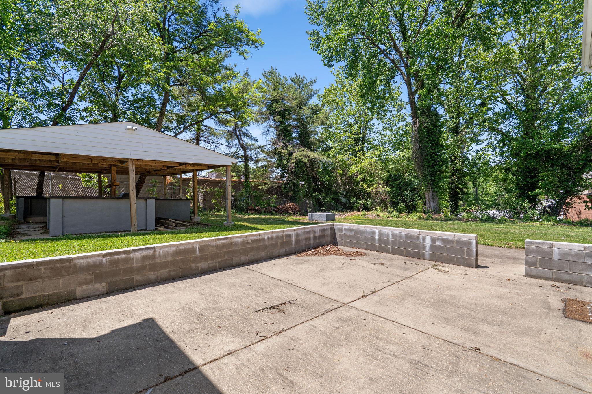 1501 Pine Grove Road Capitol Heights, MD 20743 - Photo 40 of 44 a view of outdoor space yard and swimming pool