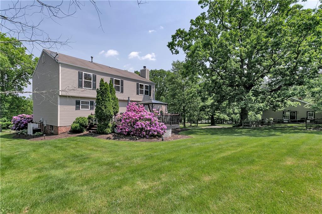 3563 Cedar Ridge Road Allison Park, PA 15101 - Photo 3 of 25 Beautifully landscaped large level backyard and supersized deck.