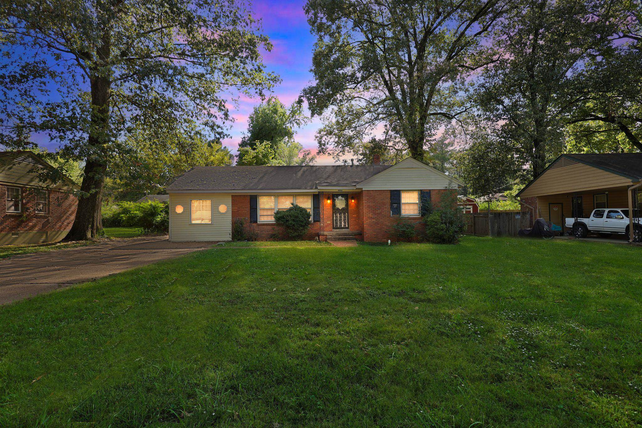 4905 Lochinvar Road Memphis, TN 38116 - Photo 24 of 33 a front view of a house with a yard